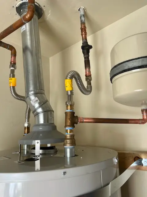 Water heater installation and plumbing repair in Breeden Forest